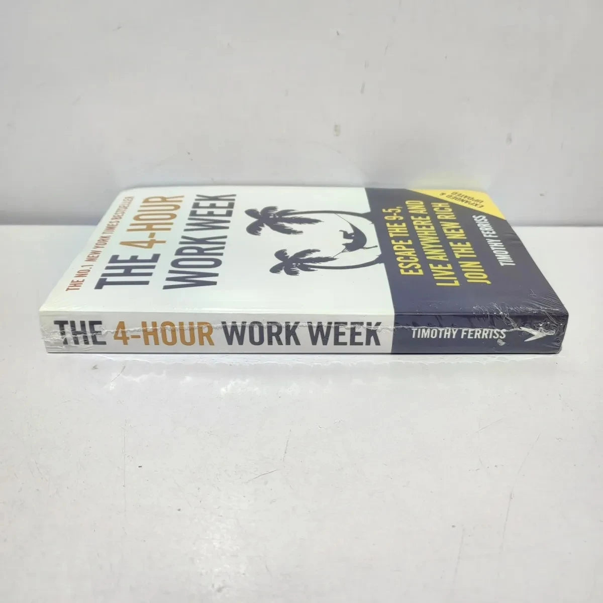 The 4-Hour Work Week: Escape the 9-5, Live Anywhere, and Join the New Rich by Timothy Ferriss – Bestselling Paperback Edition