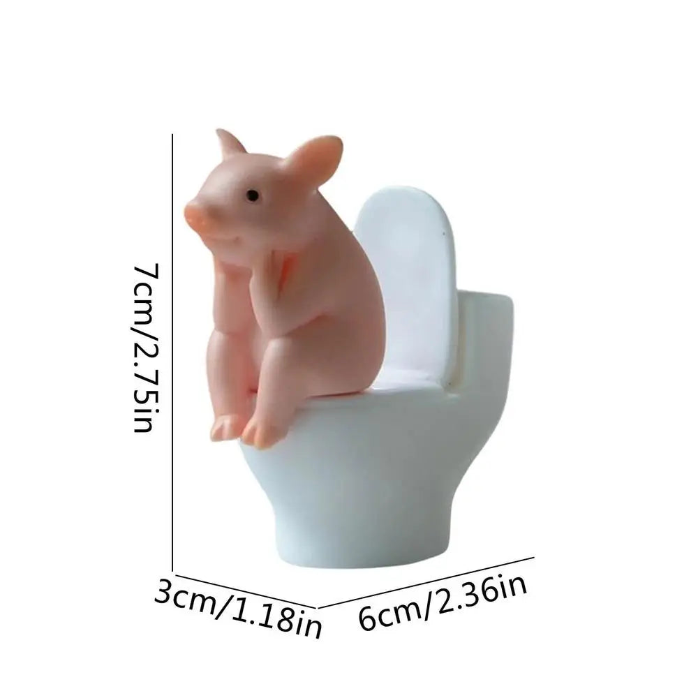 Cute Cartoon Piggy Figurine: Sitting Toilet Desktop Ornament for Fun Decor