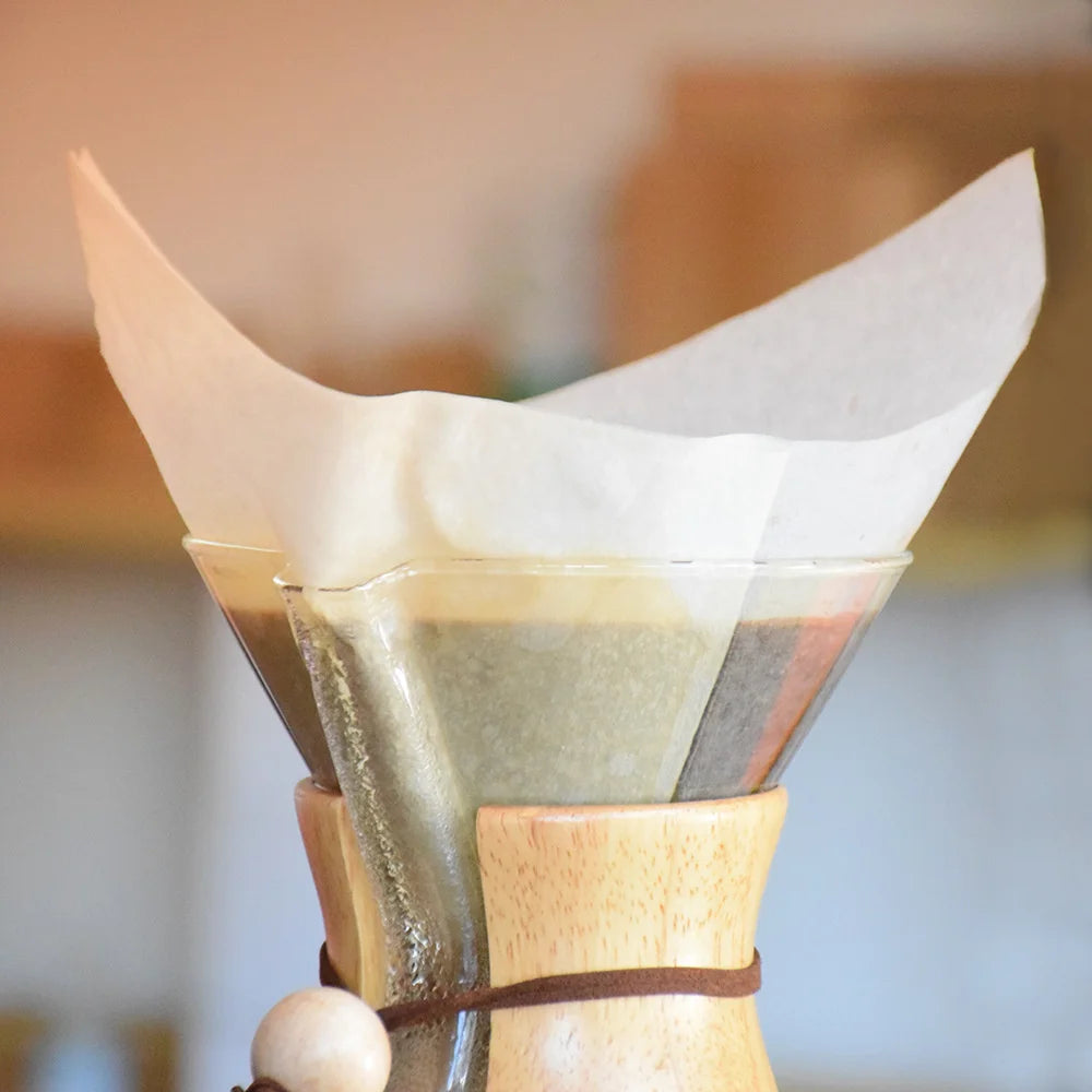 100pcs V-Shaped Coffee Filter Paper: Wood Pulp Drip Cone for Espresso and Tea Infusion