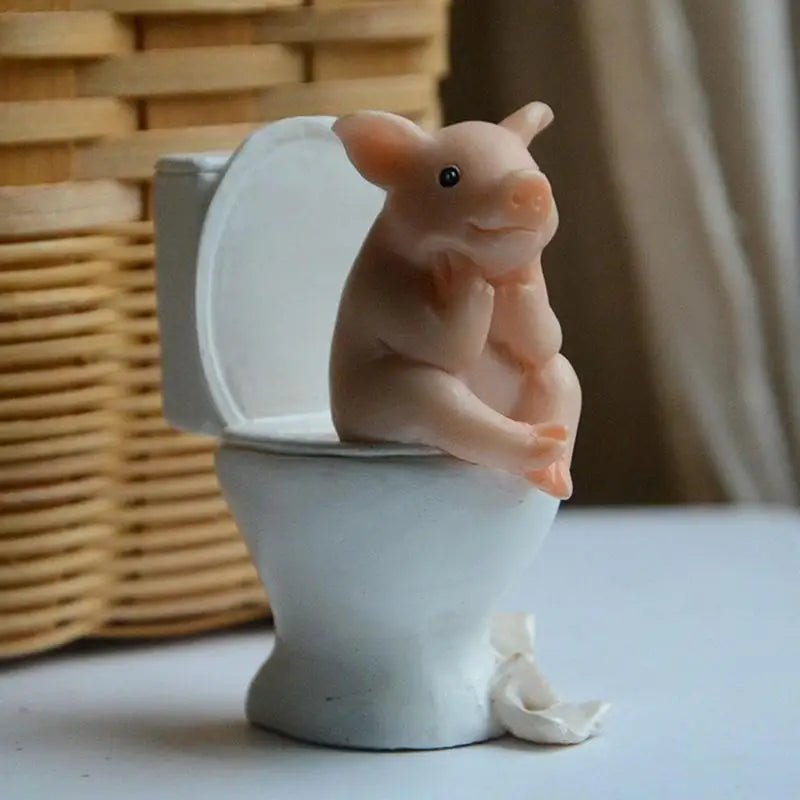 Cute Cartoon Piggy Figurine: Sitting Toilet Desktop Ornament for Fun Decor